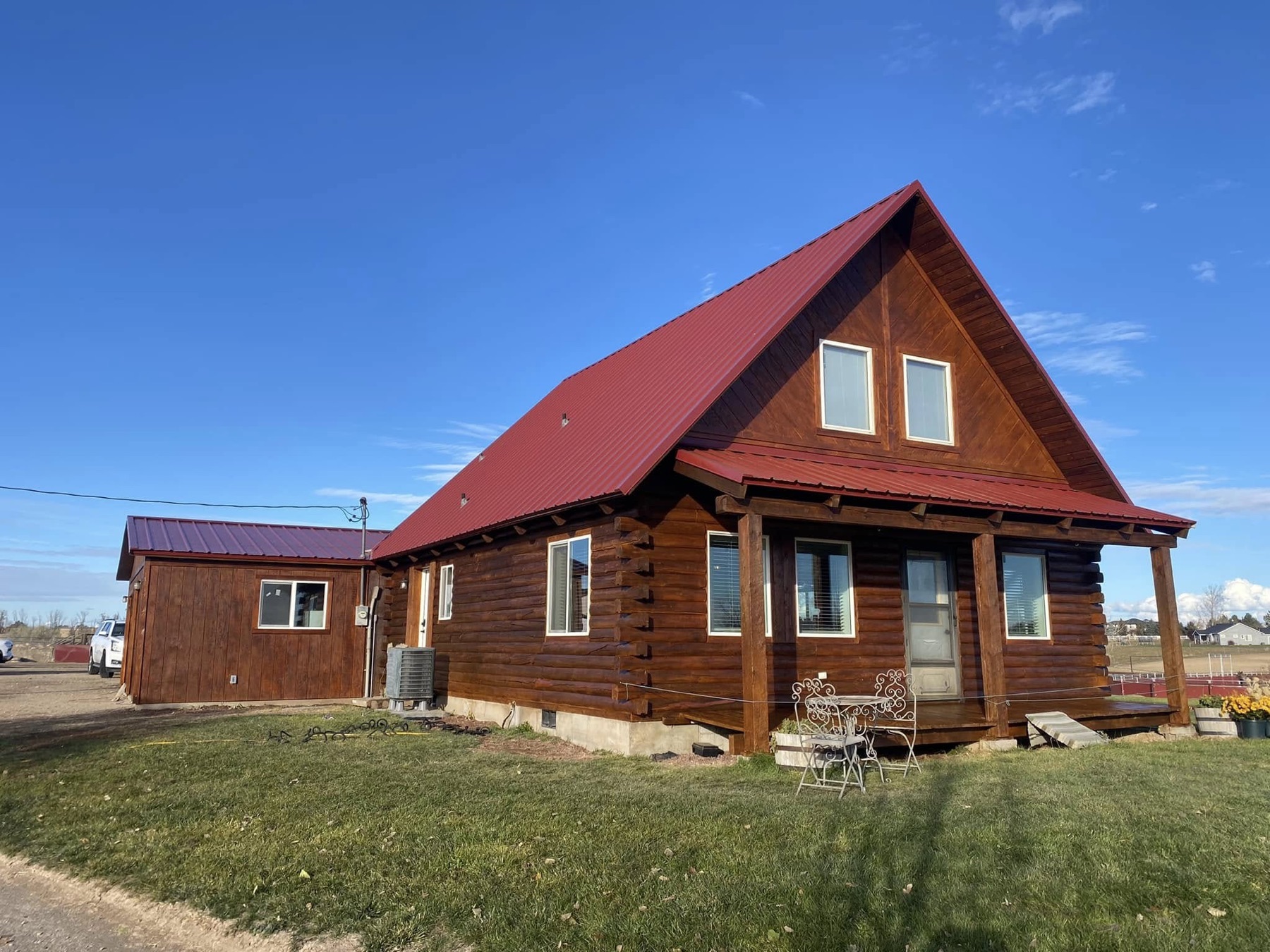 The same log home after restoration by River to River